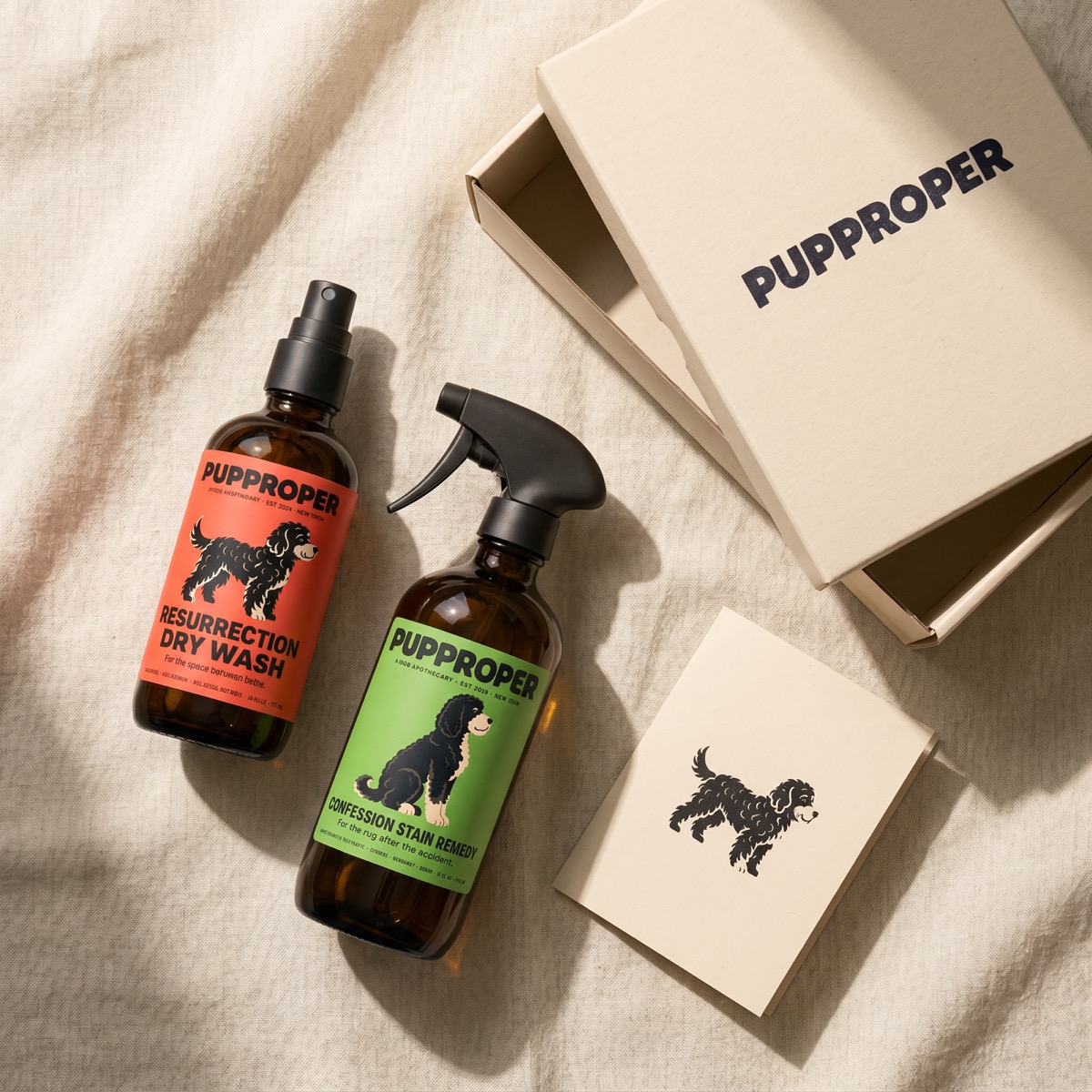 The Confessional bundle — flat-lay with bottles, gift box, and ritual card